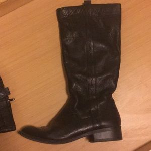 Black boots with western style stitching